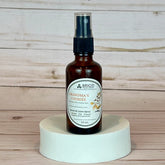 grandma's cookies room and linen spray Bottle of 'Grandma's Cookies' room & linen spray by Brigid on a wooden background