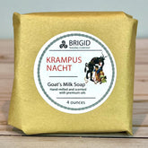 Krampusnacht Krampus Goat's Milk Soap packaging with 'Brigid Trading Company' label on a wooden surface