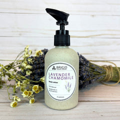 lavender chamomile natural body lotion hand crafted american made by hand in washington state by brigid trading company small business wheat straw bottles natural ingredients for healthy skin four ounce 4 ounce large bottle of lotion that lasts