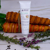 ostara hand lotion gifts for easter for mom dad grandma grandpa cousin niece nephew heather floral rosemary black pepper body care goods for spring dry sensitive skin natural lotion handmade in usa by brigid trading company kitsap county washington state us grown sustainable soy wax image shows carrot background and heather flowers rosemary with purple flowers and whole black pepper single lotion metal tube