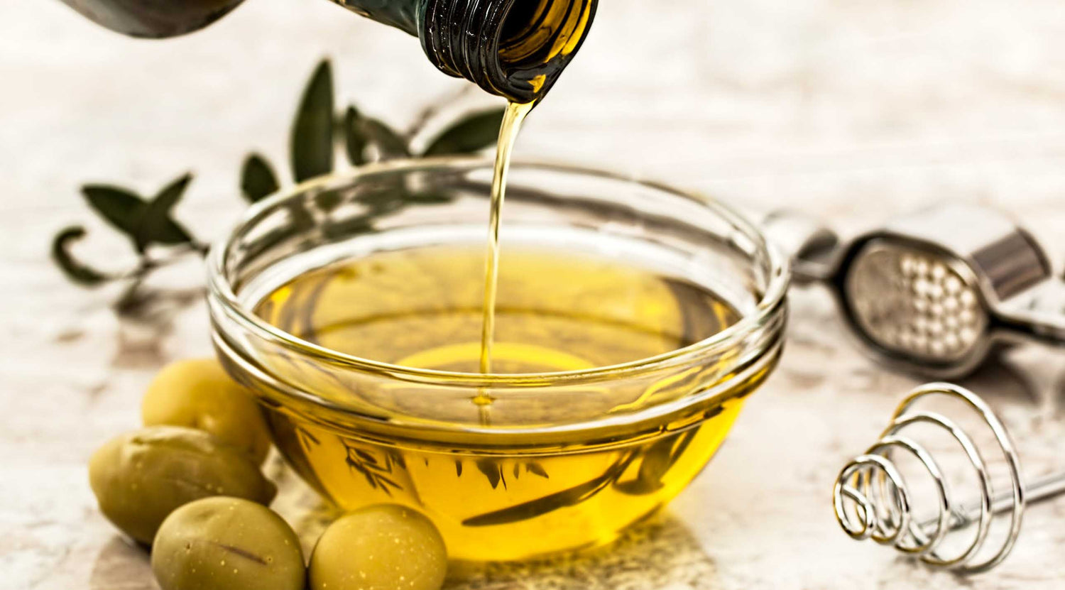 photo by pixabay olive oil in a bowl with bottle used with permission pexels kitchen cosmetics brigid trading company