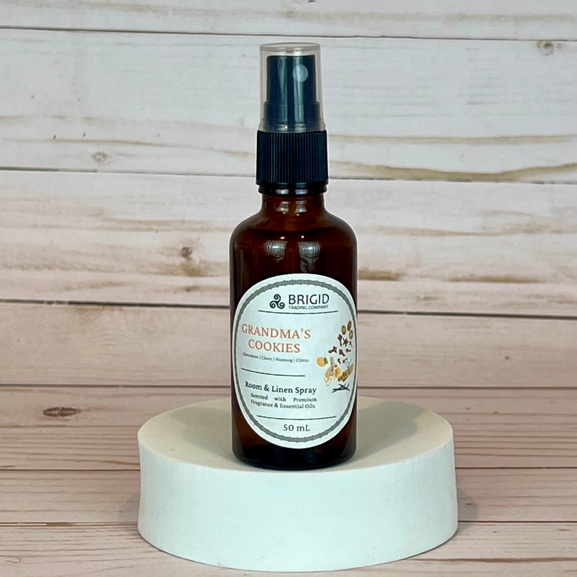 grandma's cookies room and linen spray Bottle of 'Grandma's Cookies' room & linen spray by Brigid on a wooden background