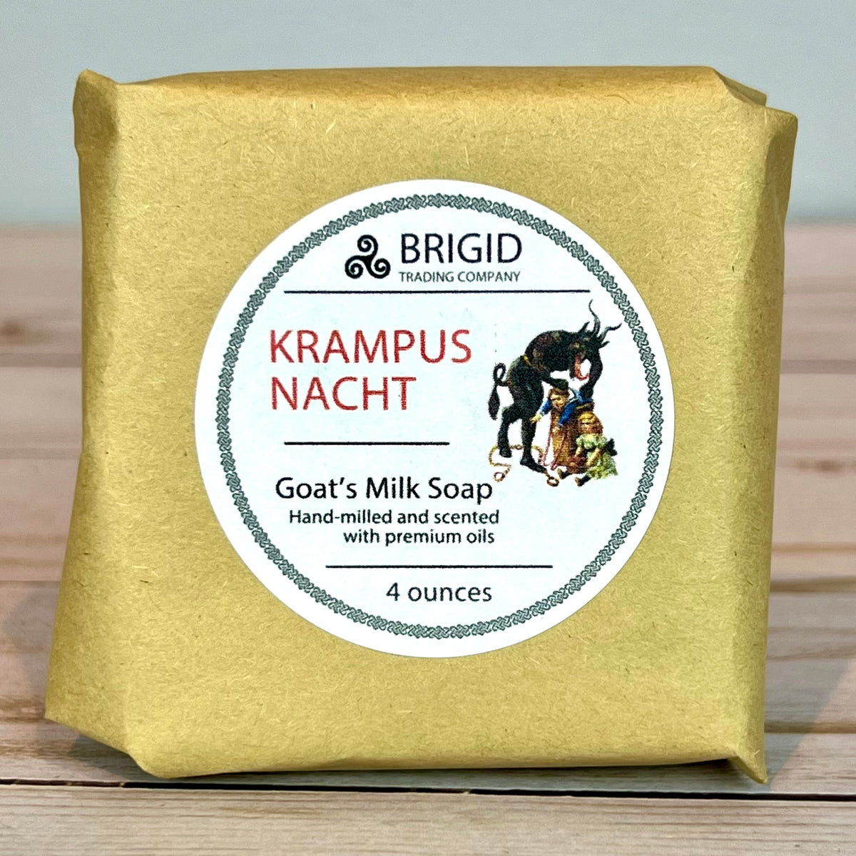 Krampusnacht Krampus Goat's Milk Soap packaging with 'Brigid Trading Company' label on a wooden surface