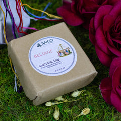 goats milk soap natural by brigid trading company beltane scent hand milled jasmine rose clary sage image bar of soap with roses and a maypole on a grassy background kitsap county washington state