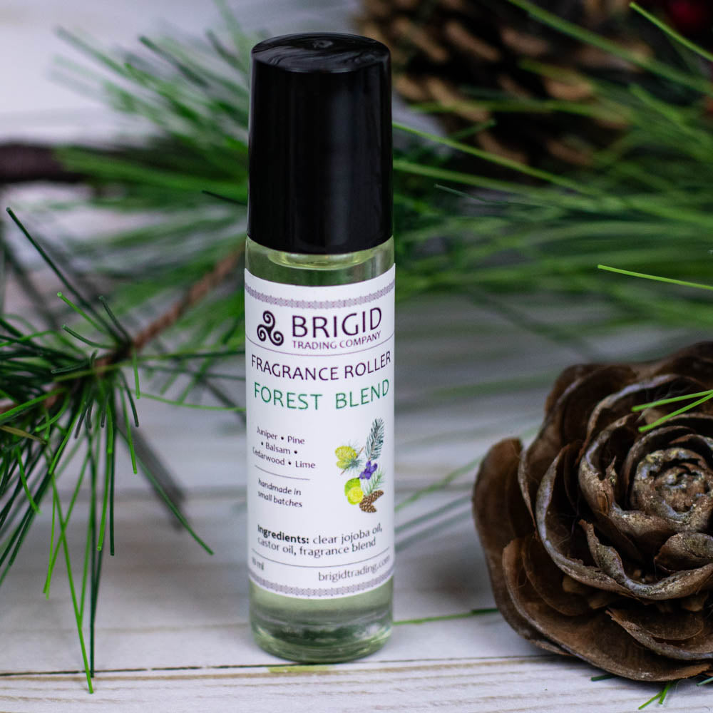 brigid trading company fragrance roller image studio photography by brigid trading company 2024 glass clear bottle with metal ball roller for perfume fragrance essential oil roller ball hand made by brigid trading company kitsap county washington state pacific northwest forest blend juniper pine balsam cedar cedarwood and lime