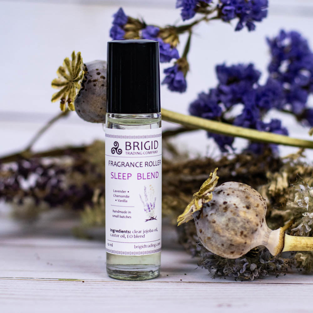 brigid trading company fragrance roller image studio photography by brigid trading company 2024 glass clear bottle with metal ball roller for perfume fragrance essential oil roller ball hand made by brigid trading company kitsap county washington state pacific northwest sleep blend essential oil roller bottle aromatherapy grade lavender chamomile and vanilla handmade