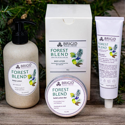 forest blend body lotion collection set by brigid trading company llc juniper pine balsam cedar lime scented essential oil aromatherapy grade lotion natural by brigid trading company llc kitsap county washington state wheat straw bottle made with eco recyclable plastic and gift box gift giving lotion sets made in washington state bremerton silverdale hand lotion and body lotion solid lotion bar trio set