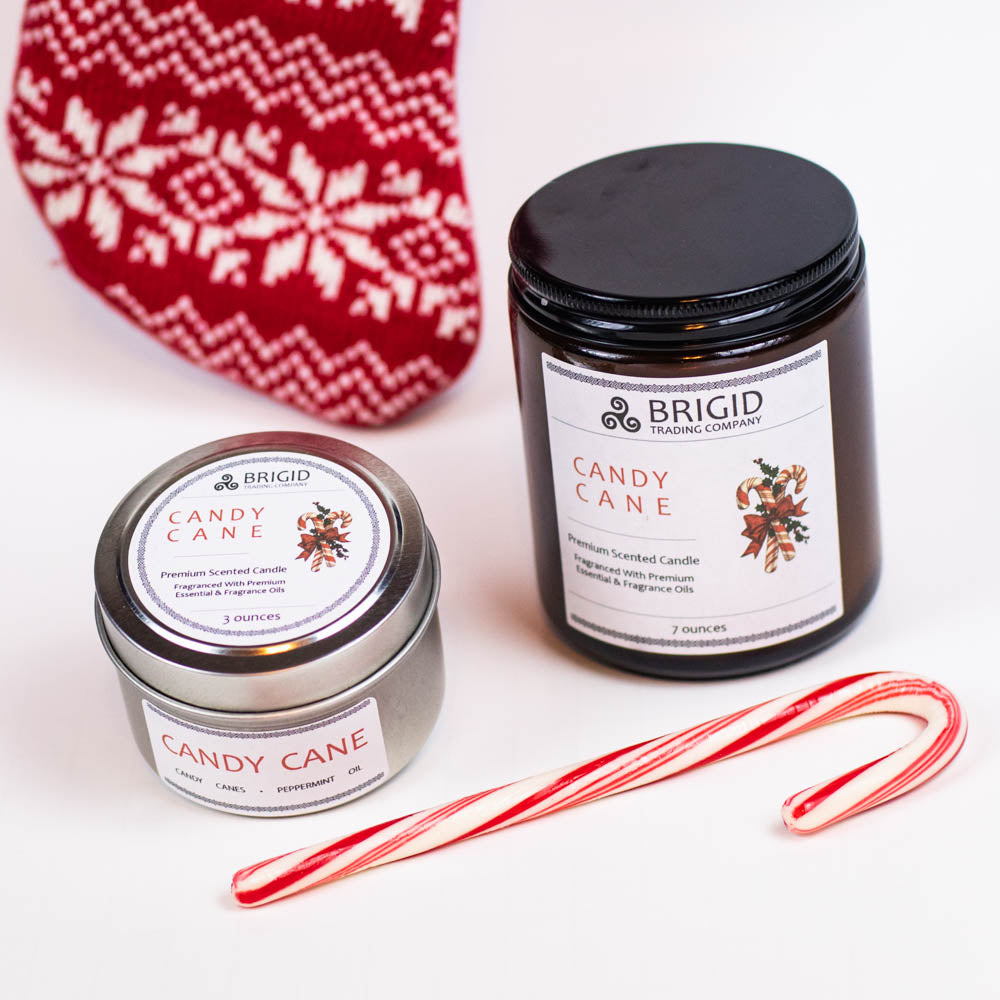 candy cane candle scent by brigid trading company christmas xmas yule yuletide irish christmas inspiration peppermint essential oil and peppermint candy cane fragrance oils the holidays holiday winter winter scent fresh santa claus gifts stocking stuffers small gifts for him for her gifts for mom dad sister brother cousin hard to find presents picky gift giving made in kitsap county washington state united states independent woman owned company 3 ounce and 7 ounce candles by brigid trading company