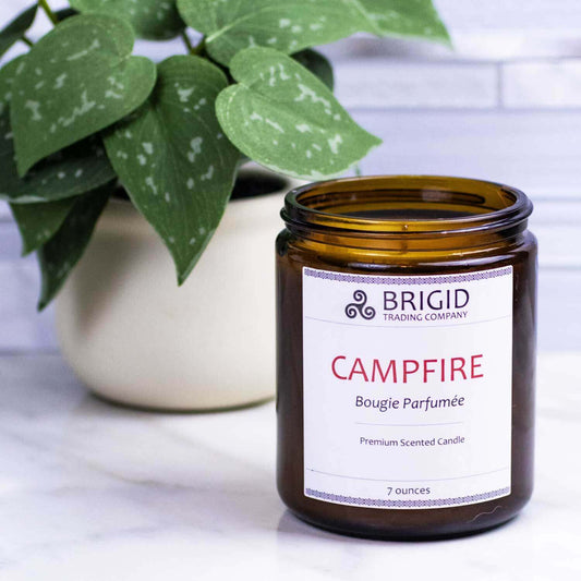 campfire candle bougie parfumee by brigid trading company llc kitsap county washington camp fire scented for home with warm smoke scent of burning wood countertop studio photography application shot