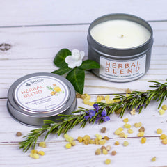 herbal blend aromatherapy candle handmade premium soy wax candle by brigid trading company llc made in kitsap county washington state usa us grown sustainable soy wax and essential oils only purifying scents for home refresh stale space funky smell defunk gifts for her gifts for him spring cleaning candle rosemary myrtle and frankincense scented cleansing smudge alternatives to purify home image shows original studio photography showing herbal blend soy wax candles small travel candle lid tin container