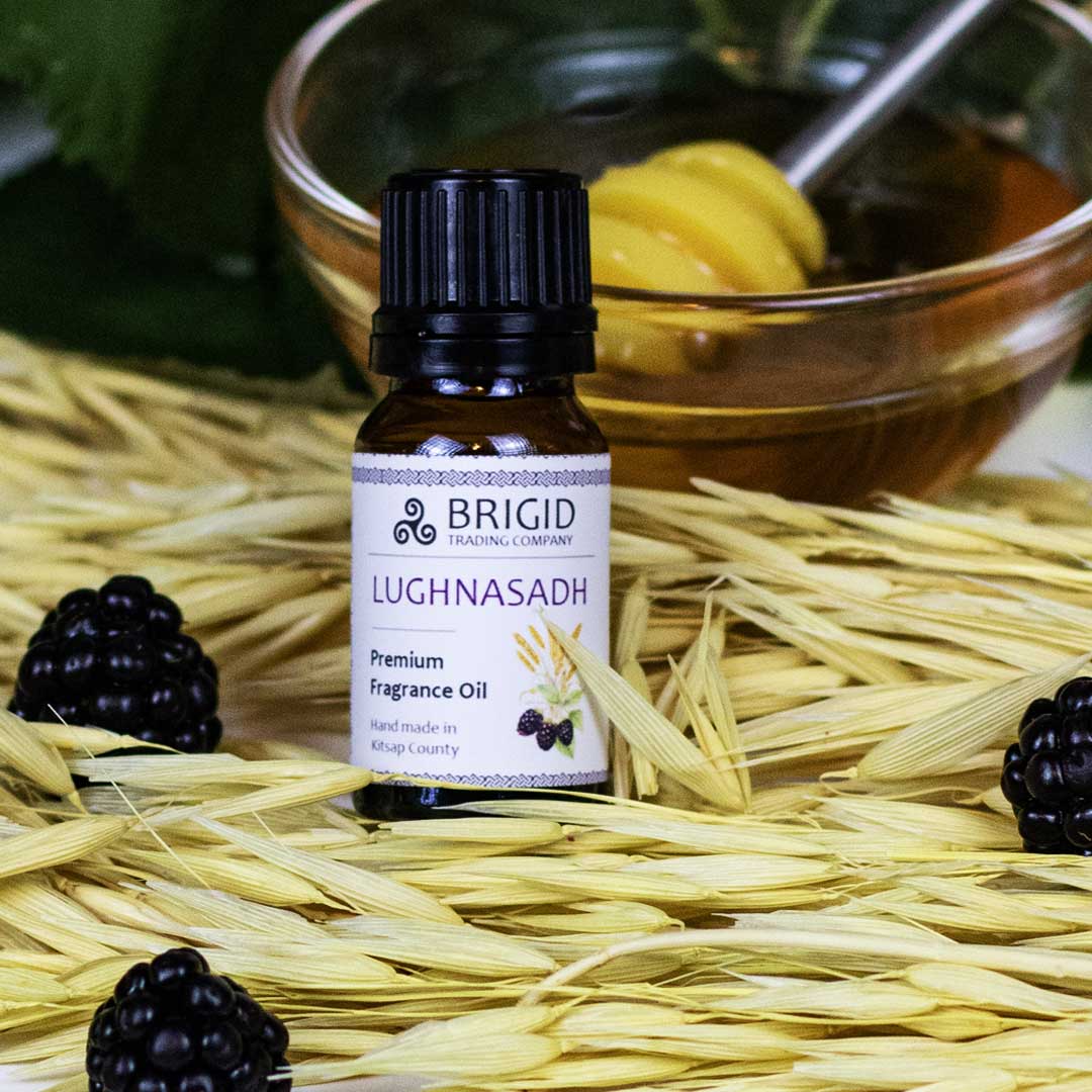 lughnasadh blackberry leaves in the background with dried oats single blackberries and honey premium fragrance diffuser oil blackberry and oatmeal handmade in kitsap county washington state usa oil for home diffuser humidifier bedside winter dry air fun scent